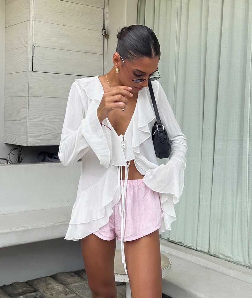 Deep V-Neck Top with Ruffle Detail